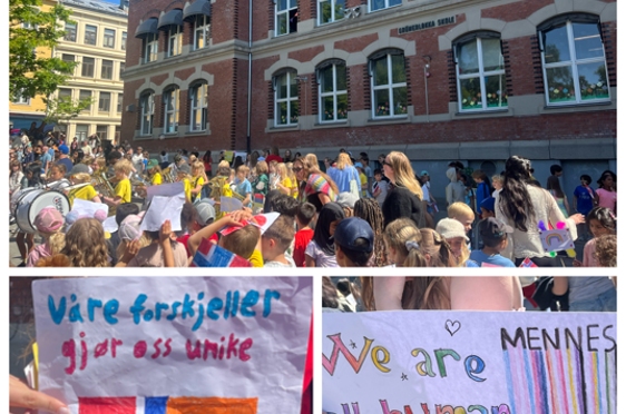 en gruppe mennesker som holder skilt