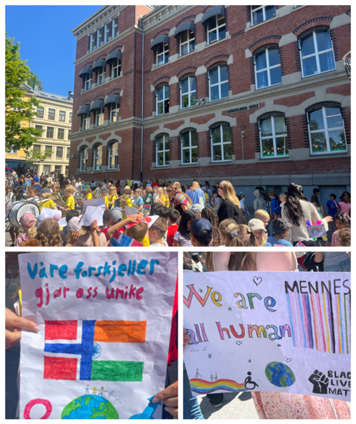 en gruppe mennesker som holder skilt